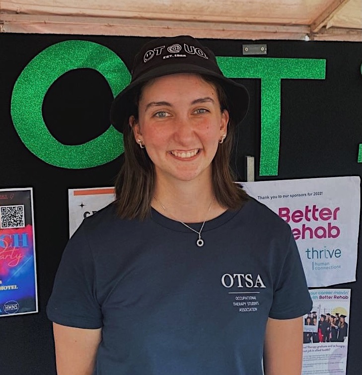 Lucy, a volunteer, at a community exhibition.