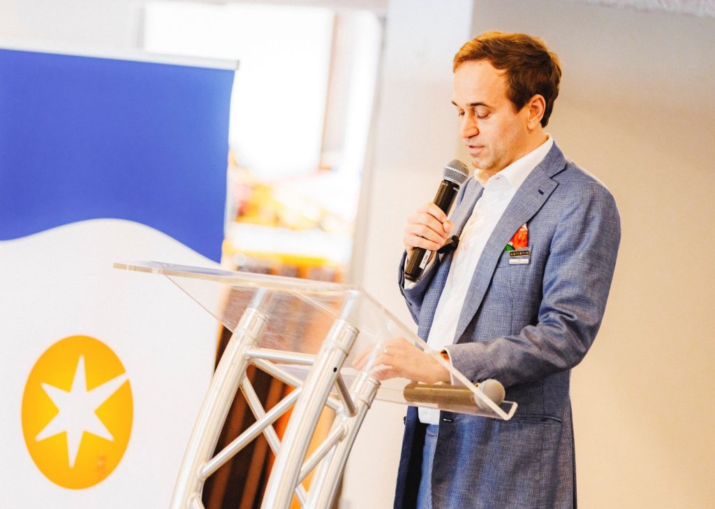 Casey Archbald, giving a speech at the Empower Autism 30 Year Anniversary event.